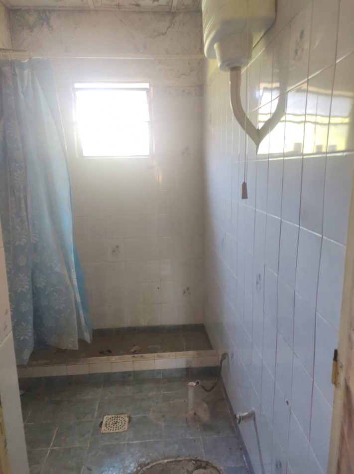 Lote con casa a reciclar 