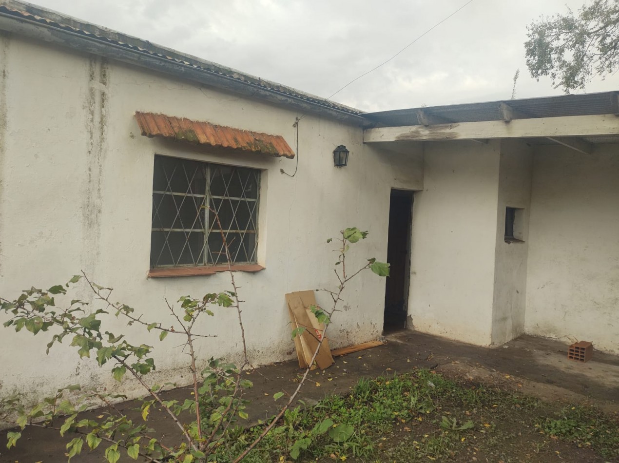 Lote con casa a reciclar 